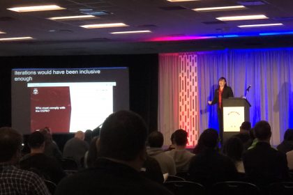 Rian Kinney speaking in front of audience at WordCamp US 2019